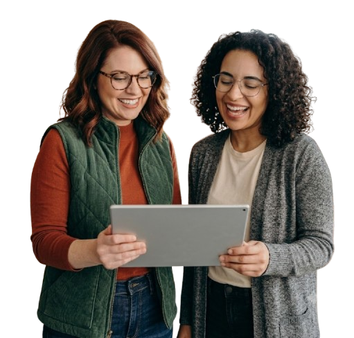 Two business women reviewing results together on a tablet